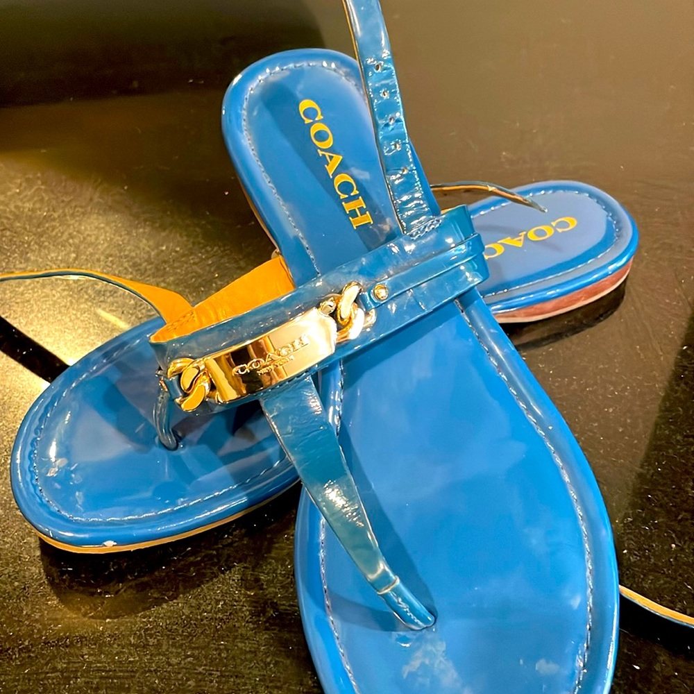 Pair of Coach blue patent thong sandals.  Like New!!